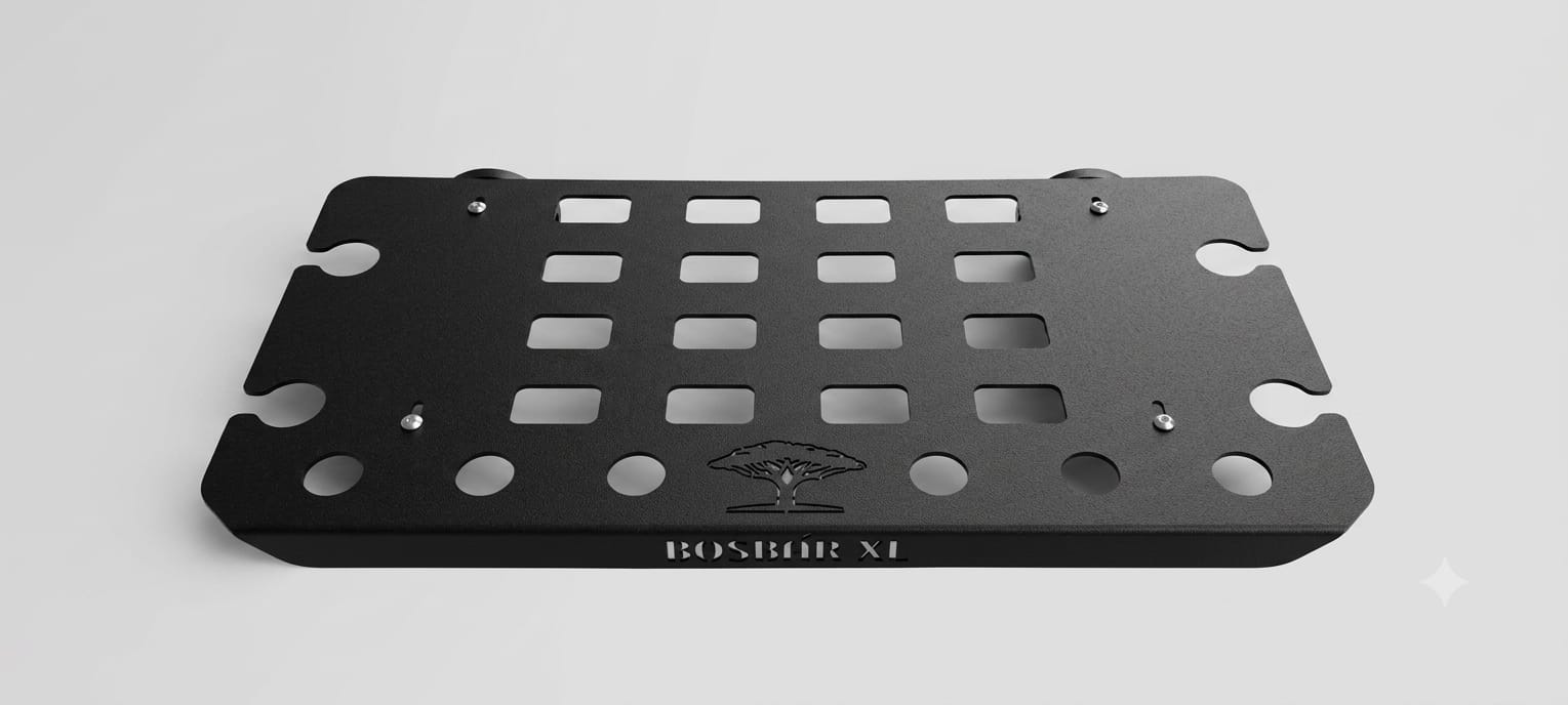 A Black Ferro Grain powder coated alluminium with a grid of rectangular cutouts and circular holes, featuring the text 'BOSBAR XL' and a small emblem in the center, shown on a light gray background.